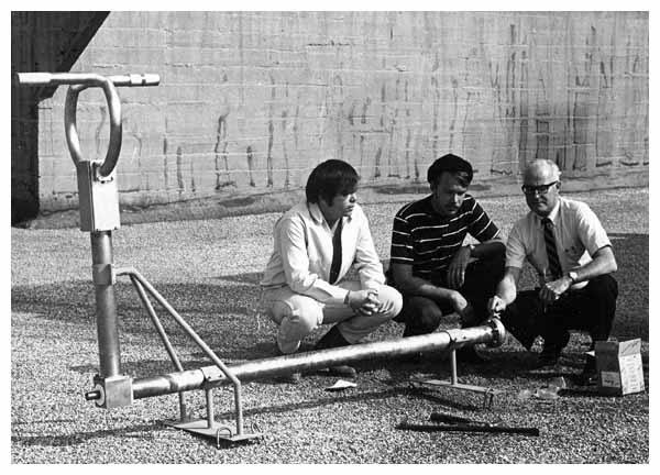 Students admire antenna